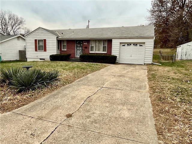 single story home featuring a front lawn and a garage