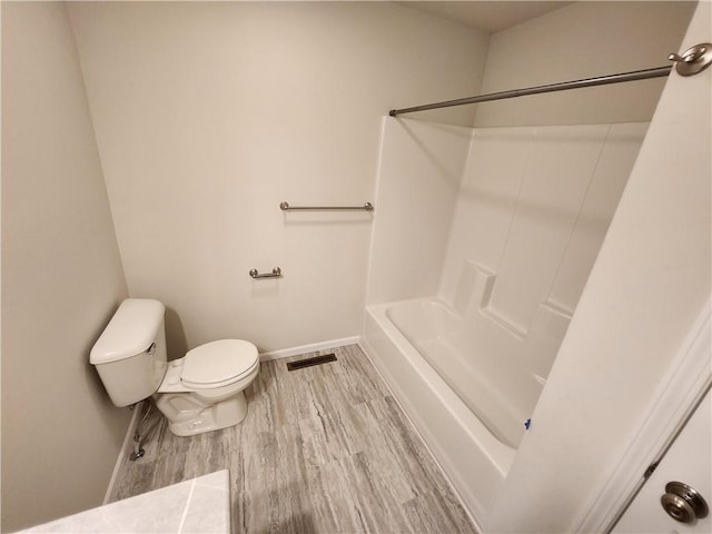 bathroom featuring toilet