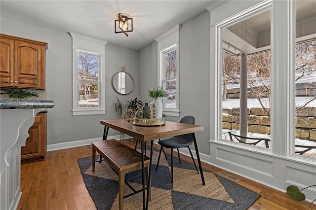 dining area with light wood-type flooring