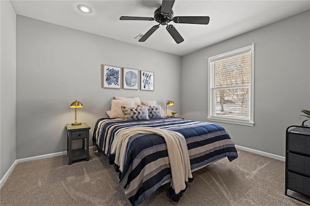 bedroom featuring ceiling fan and carpet floors