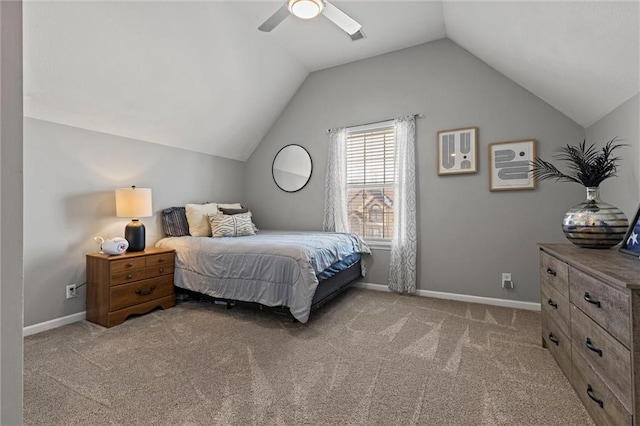 carpeted bedroom featuring ceiling fan and lofted ceiling