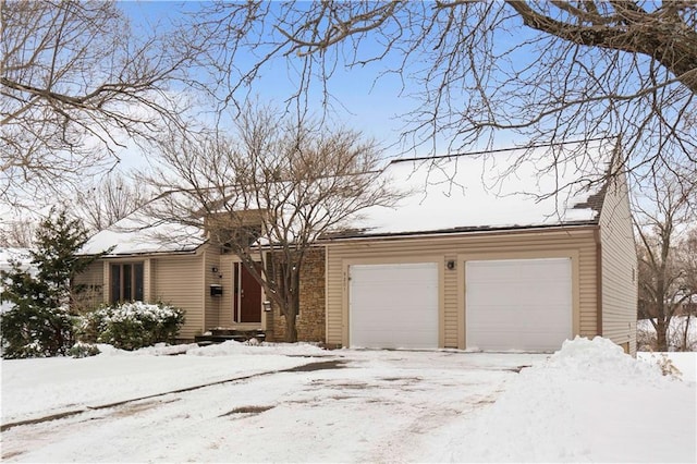 view of front of property featuring a garage