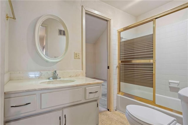 full bathroom with toilet, combined bath / shower with glass door, and vanity