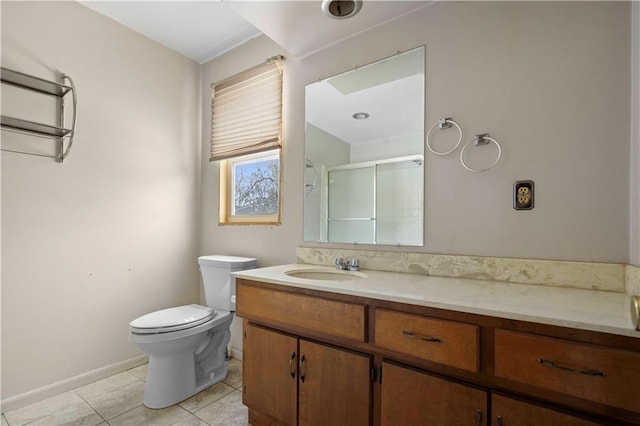 bathroom featuring an enclosed shower, vanity, toilet, and tile patterned flooring