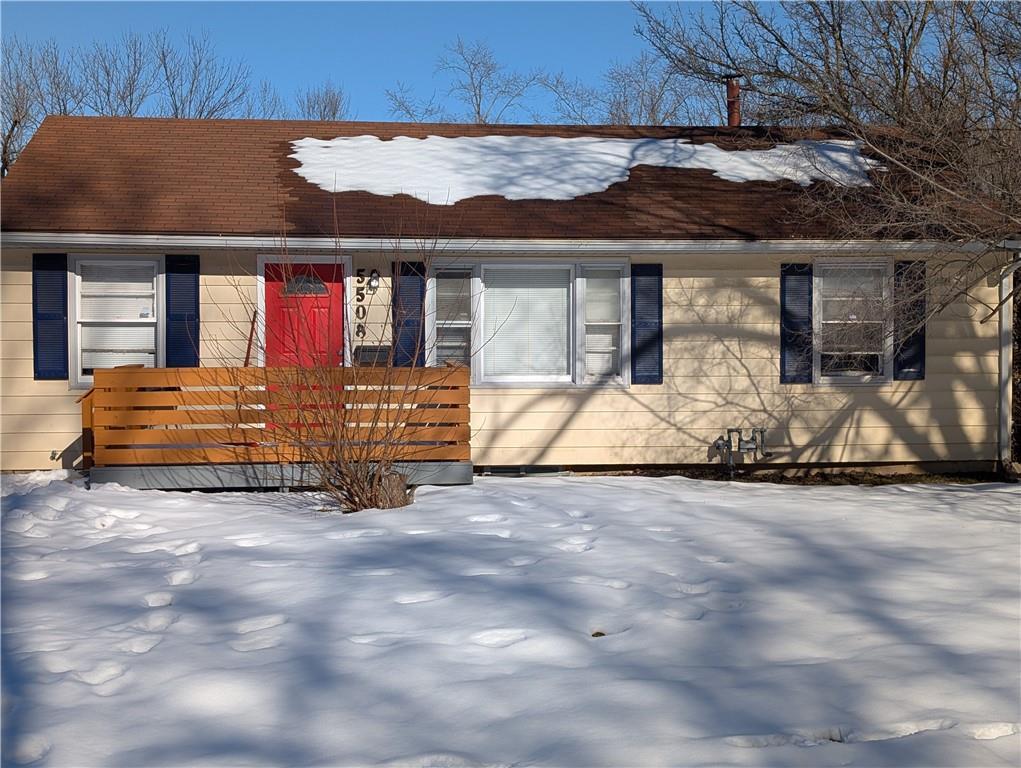 view of snow covered property