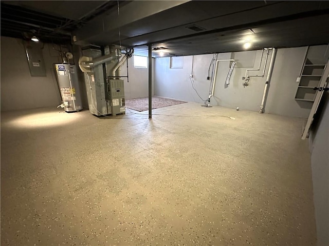 basement with heating unit and gas water heater