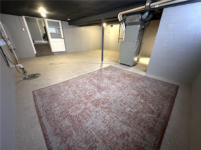 basement featuring heating unit