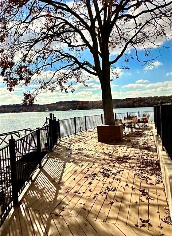 deck featuring a water view