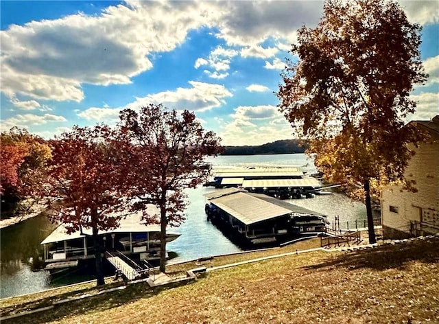 dock area featuring a water view