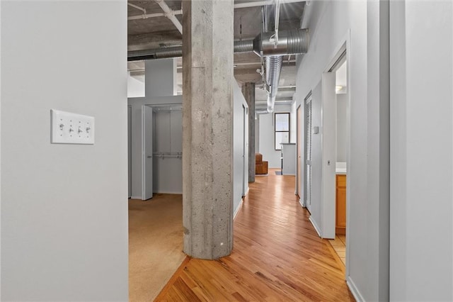 corridor featuring light wood-type flooring