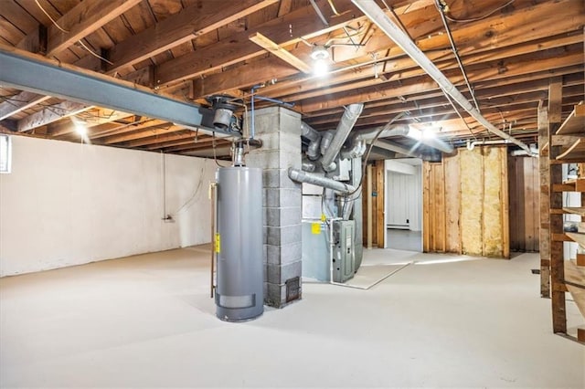 basement featuring gas water heater and heating unit