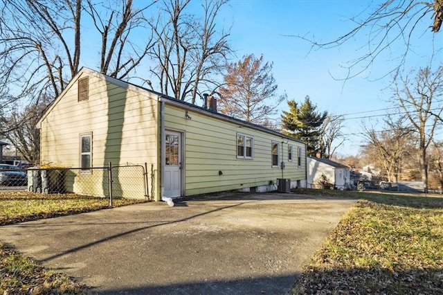 view of property exterior featuring central AC