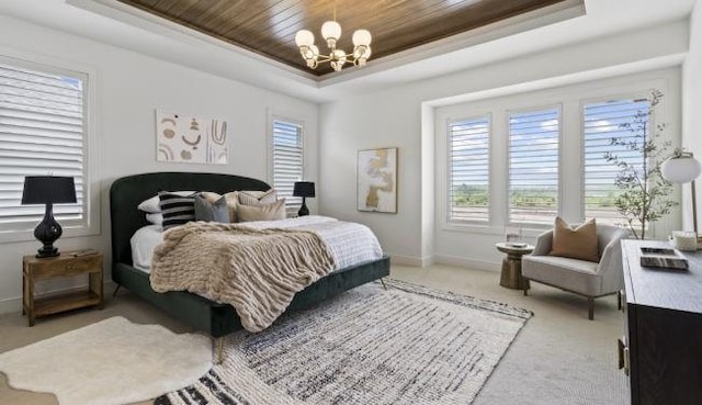 16905 Parkhill St, Overland Park, KS 66221 - bedroom with a raised ceiling, a chandelier, light colored carpet, and wood ceiling