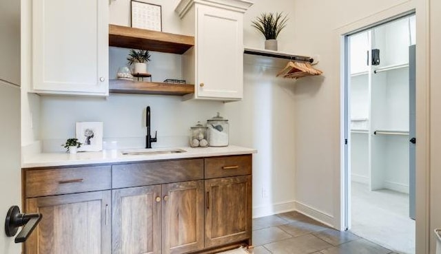 16905 Parkhill St, Overland Park, KS 66221 - bar with a sink and light tile patterned flooring