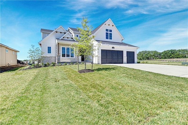 16905 Parkhill St, Overland Park, KS 66221 - modern farmhouse style home with a garage, concrete driveway, a front lawn, and stone siding