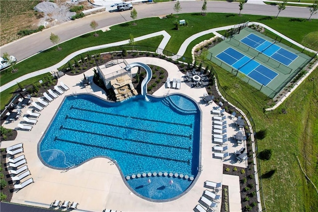 view of pool featuring tennis court