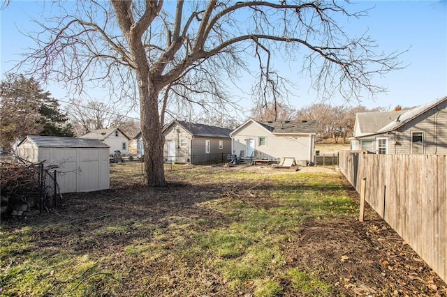 view of yard with a storage unit