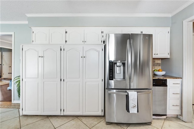 kitchen featuring white cabinets, light tile patterned flooring, and stainless steel refrigerator with ice dispenser