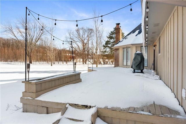 view of snowy yard