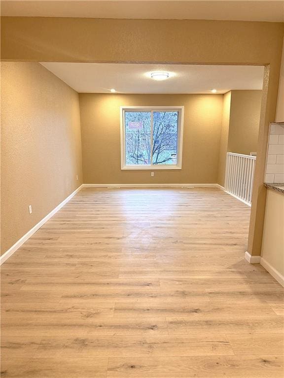 unfurnished room featuring light wood-type flooring