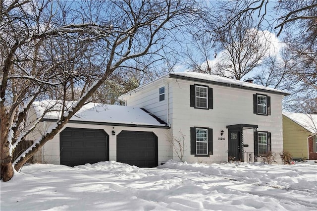 view of front of property featuring a garage