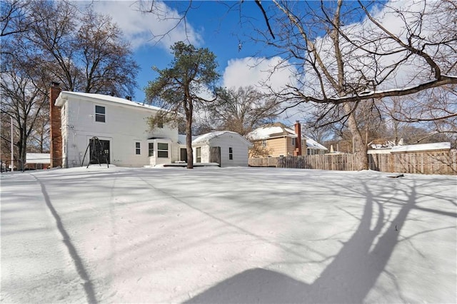 view of yard covered in snow