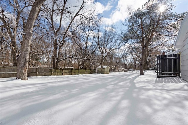 view of yard layered in snow