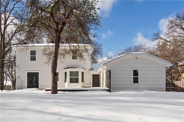 view of snow covered house