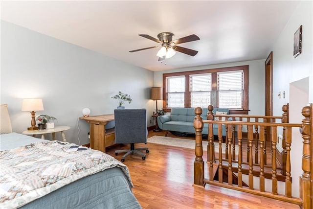 bedroom with hardwood / wood-style flooring