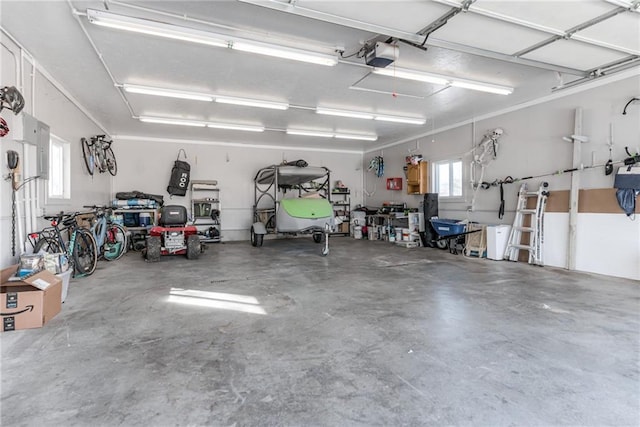 garage featuring a garage door opener