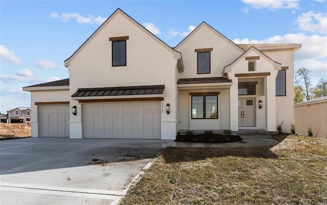 view of front of home featuring a garage