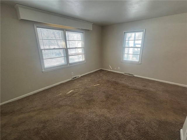 view of carpeted spare room