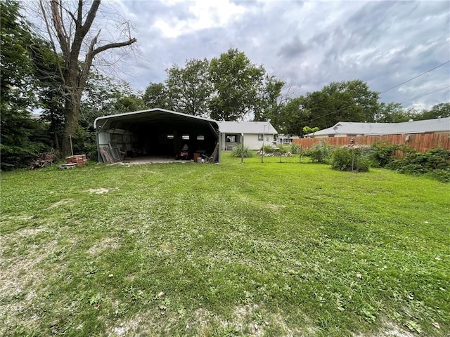 view of yard with a carport