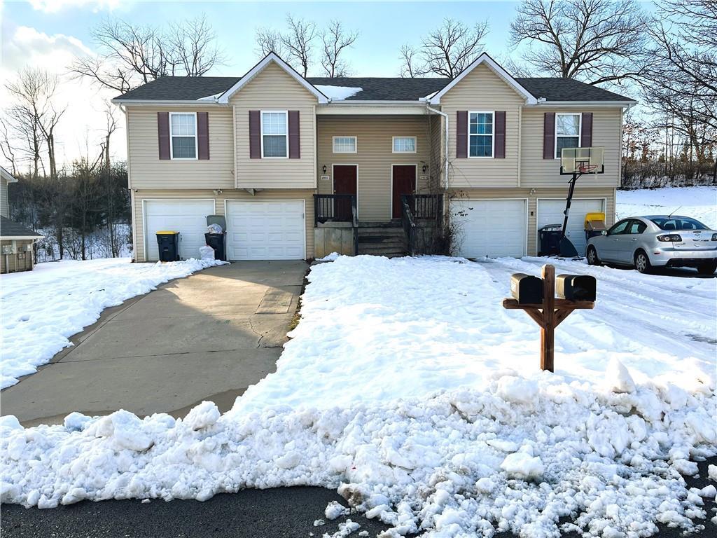 raised ranch with a garage