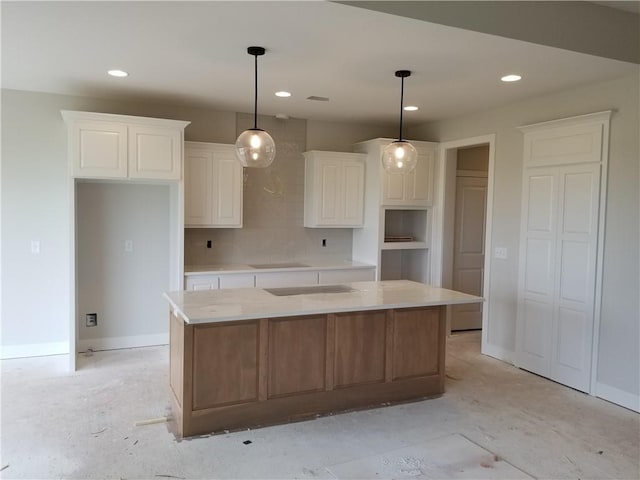 5005 146th St, Basehor, KS 66007 - kitchen with white cabinetry, a center island, decorative light fixtures, and recessed lighting