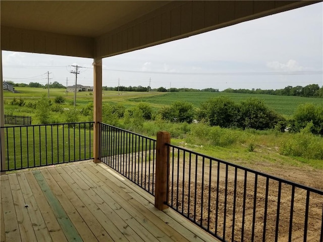 5005 146th St, Basehor, KS 66007 - wooden terrace with a rural view