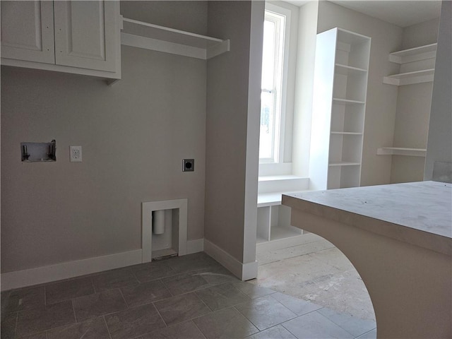 5005 146th St, Basehor, KS 66007 - washroom with hookup for an electric dryer and baseboards