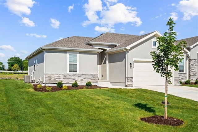 5005 146th St, Basehor, KS 66007 - view of front of home featuring stone siding, stucco siding, concrete driveway, a garage, and a front yard