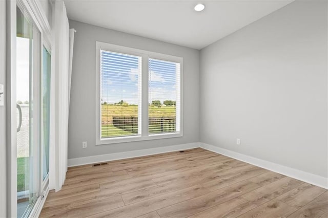 5005 146th St, Basehor, KS 66007 - unfurnished room with light wood-type flooring and recessed lighting