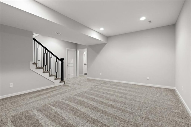 5005 146th St, Basehor, KS 66007 - finished basement featuring carpet, recessed lighting, and stairway