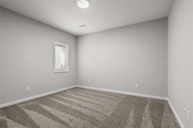 5005 146th St, Basehor, KS 66007 - carpeted empty room featuring baseboards