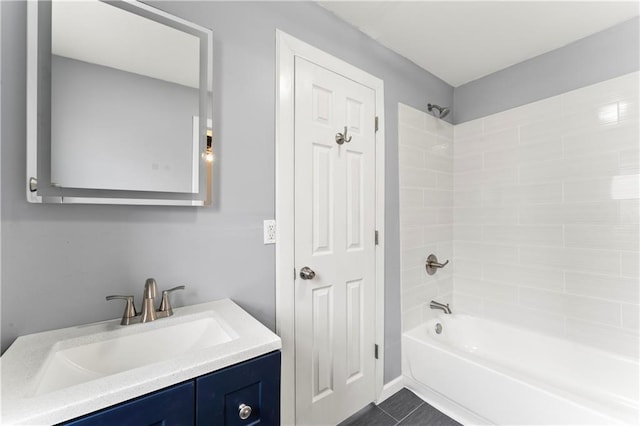 bathroom with vanity and shower / bathing tub combination