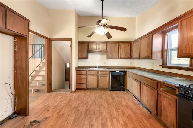 kitchen featuring sink, ceiling fan, dishwasher, range, and light hardwood / wood-style floors