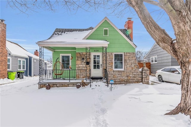 bungalow-style home with covered porch