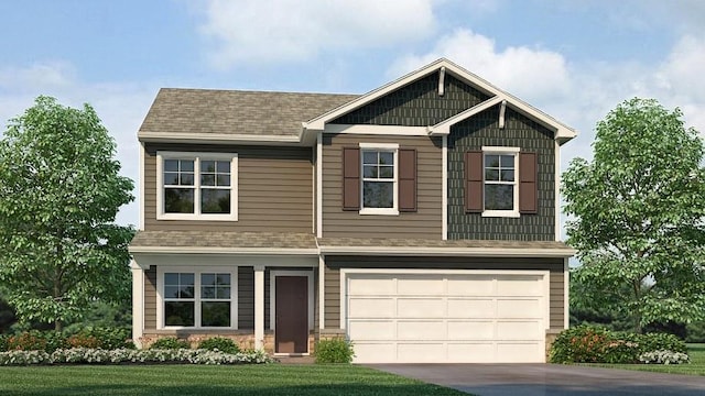 view of front of property featuring a garage and a front lawn