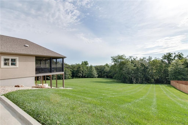 view of yard featuring a sunroom