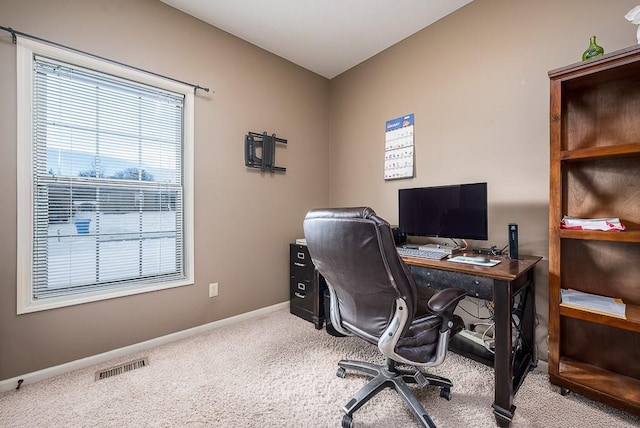 view of carpeted office space