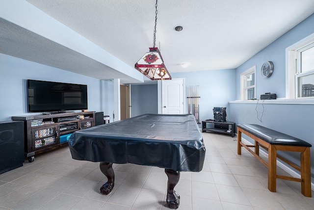 rec room with a textured ceiling and pool table