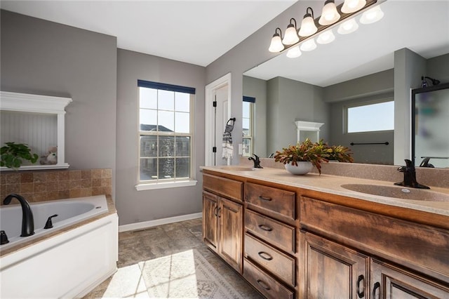 bathroom featuring a bathing tub and vanity