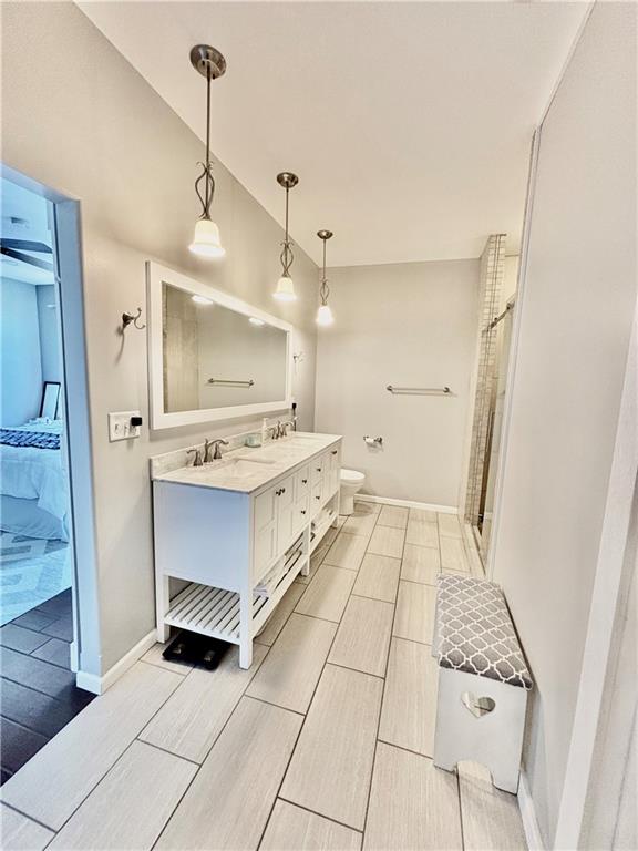 bathroom with vanity and toilet